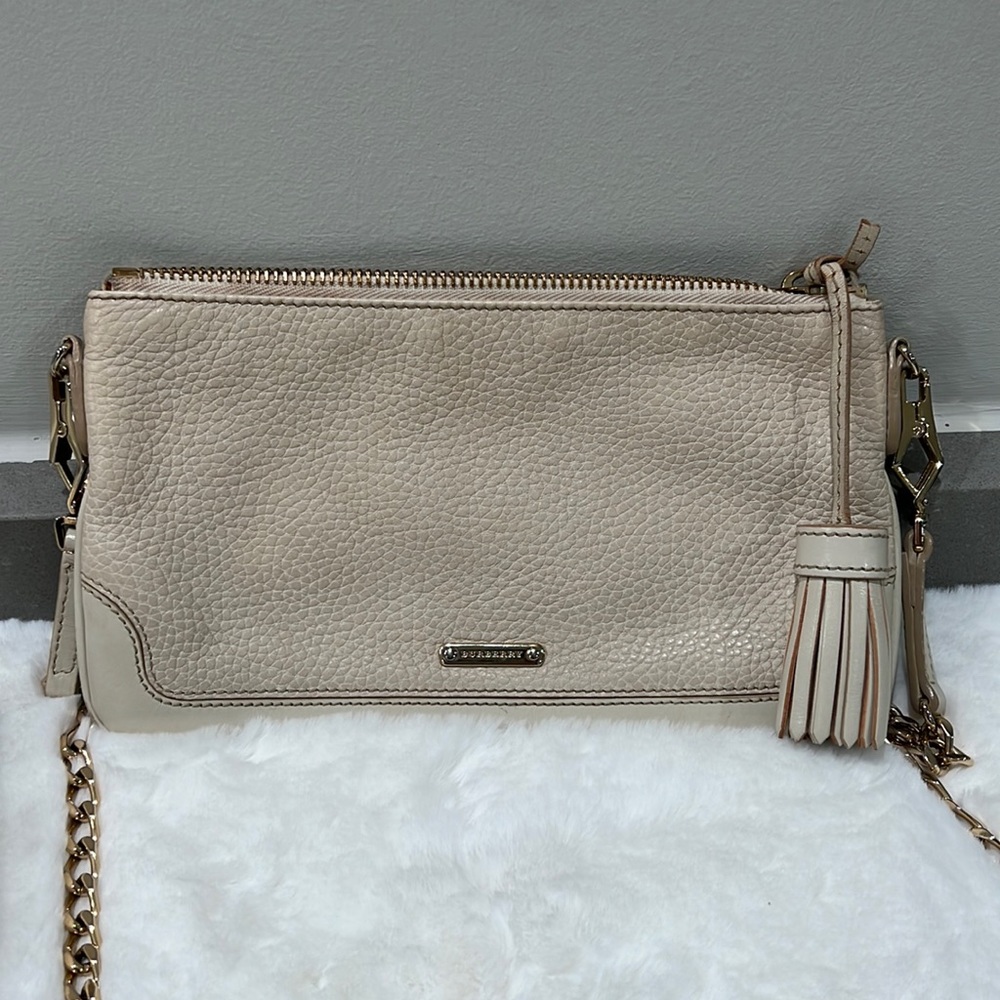 Burberry cross body with gold chain.